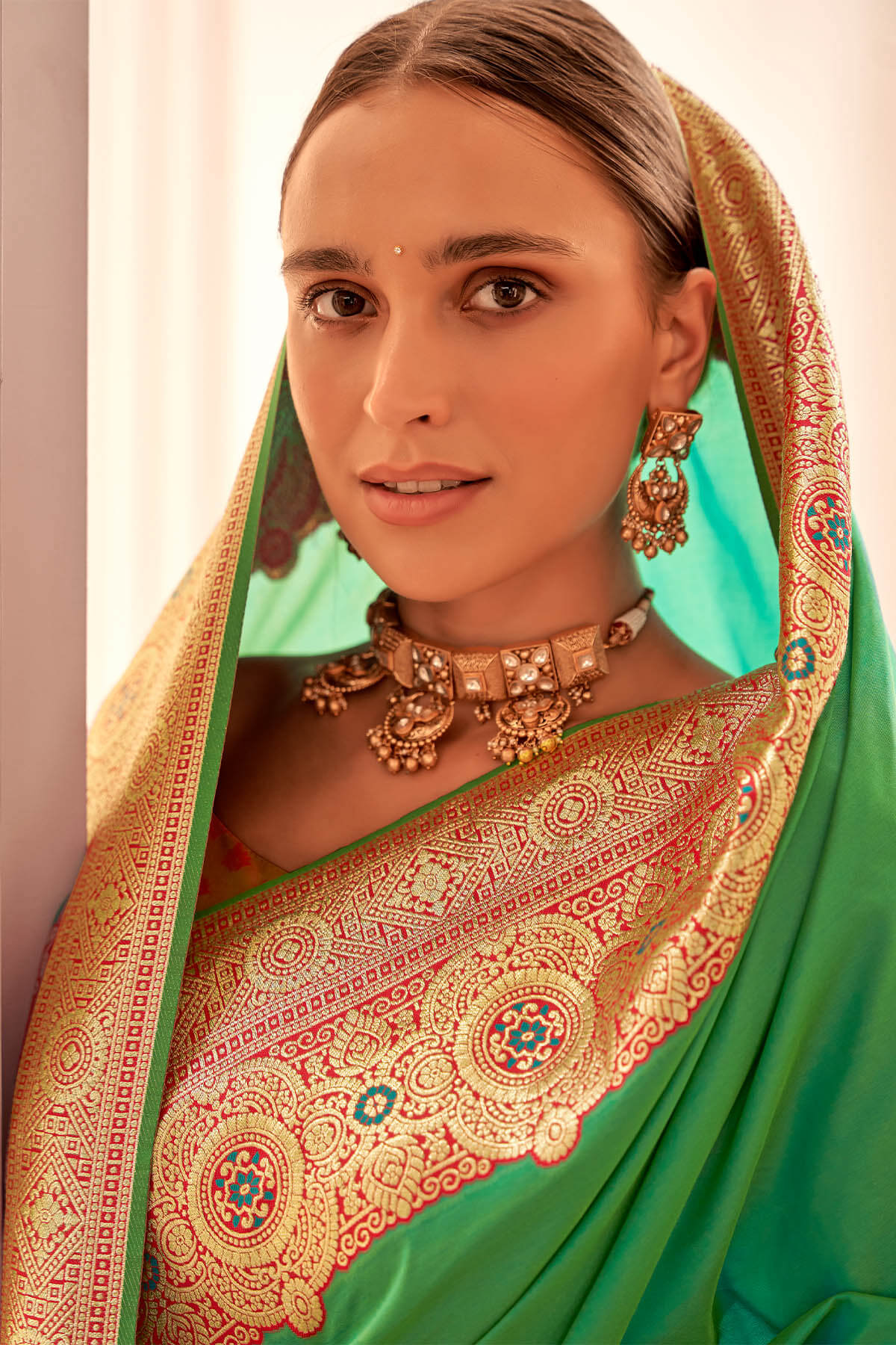 Fugacious Dark Green Soft Banarasi Silk Saree With Opulent Blouse Piece