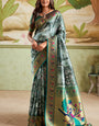 Redolent Dark Green Paithani Silk Saree With Dalliance Blouse Piece