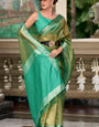 Sumptuous Green Soft Tissue Silk Saree With Gossamer Blouse Piece