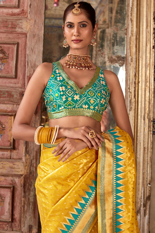 Load image into Gallery viewer, Flameboyant Yellow Soft Banarasi Silk Saree With Stunner Blouse Piece
