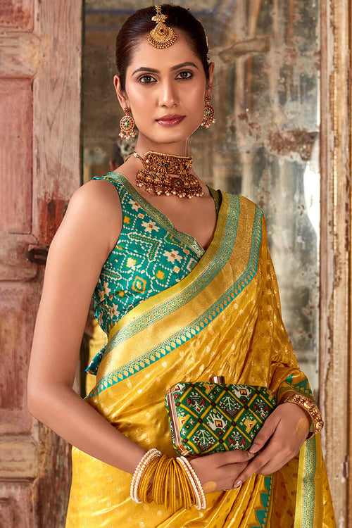 Load image into Gallery viewer, Flameboyant Yellow Soft Banarasi Silk Saree With Stunner Blouse Piece
