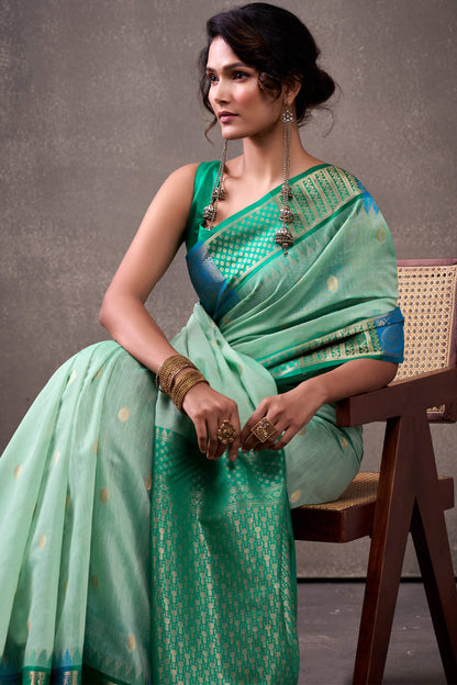 Inspiring Turquoise Cotton Silk Saree With Radiant Blouse Piece