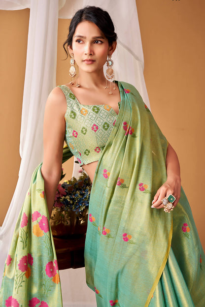 Redolent Green Banarasi Tissue Silk Saree With Forbearance Blouse Piece