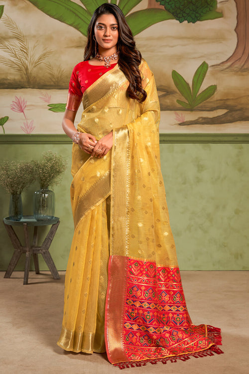 Load image into Gallery viewer, Enchanting Yellow Soft Banarasi Silk Saree With Prodigal Blouse Piece
