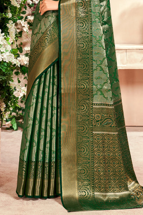 Load image into Gallery viewer, Desiring Dark Green Kanjivaram Silk Saree With Ravishing Blouse Piece
