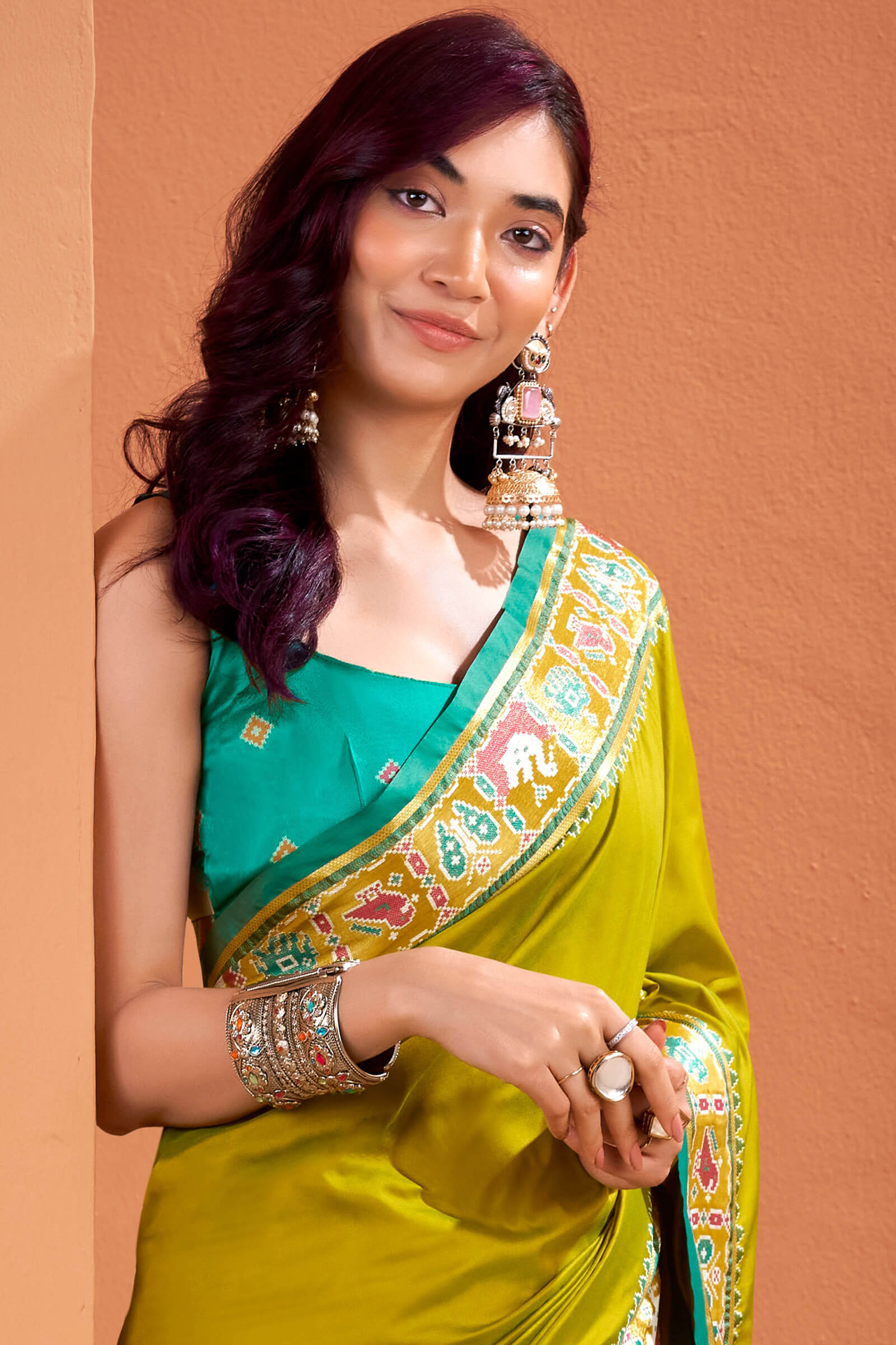 Designer Mustard Patola Silk Saree with Entrancing Blouse Piece