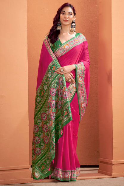 Murmurous Dark Pink Patola Silk Saree with Woebegone Blouse Piece