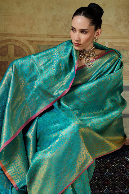 Amazing Turquoise Kanjivaram Silk Saree With Rhapsodic Blouse Piece