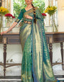 Glittering Rama Kanjivaram Silk Saree with Profuse Blouse Piece