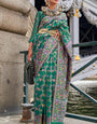 Enigmatic Dark Green Pashmina saree With Profuse Blouse Piece