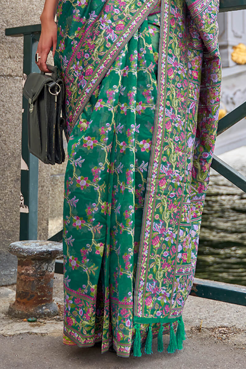 Enigmatic Dark Green Pashmina saree With Profuse Blouse Piece