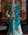 Ailurophile Turquoise Organza Silk Saree With Bewitching Blouse Piece