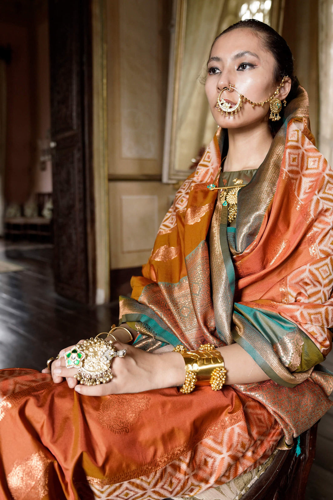 Gossamer Orange Soft Banarasi Silk Saree With Tantalizing Blouse Piece