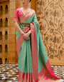 Unique Sea Green Kanjivaram Silk Saree With Outstanding Blouse Piece