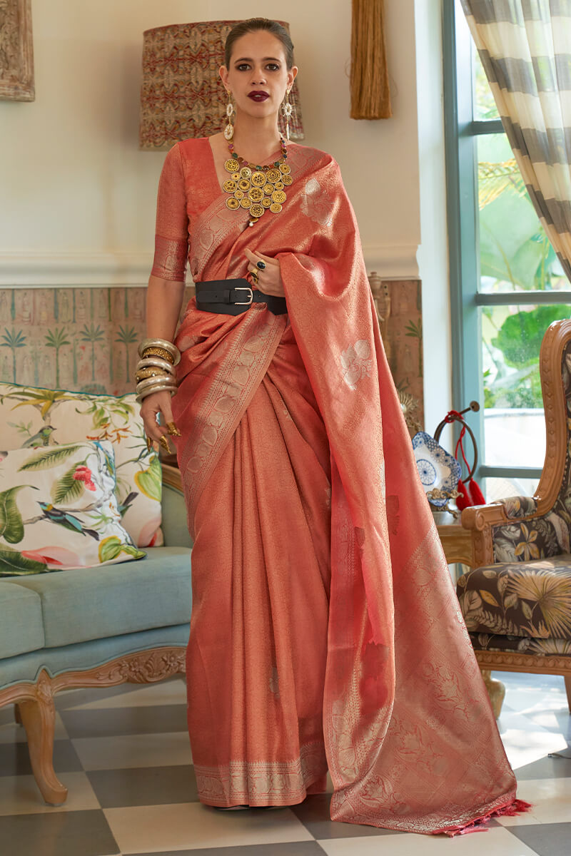 Outstanding Peach Soft Banarasi Silk Saree With Intricate Blouse Piece