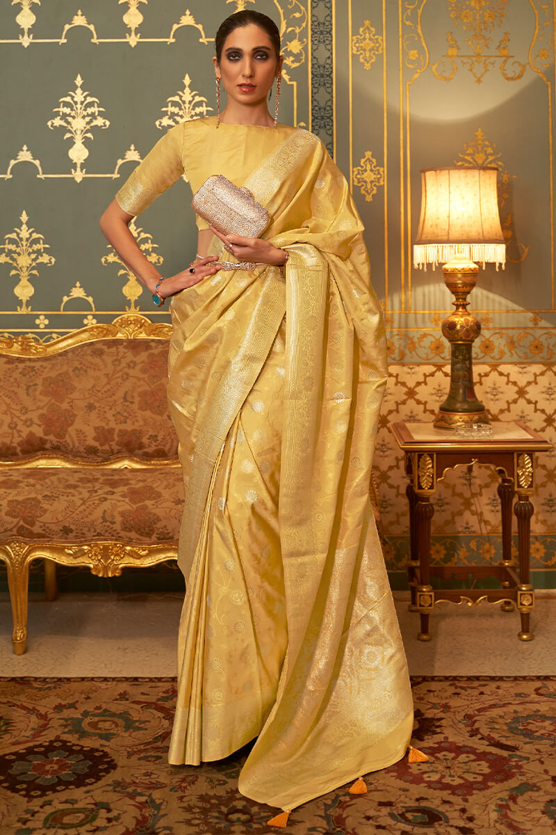 Adorning Yellow Soft Banarasi Silk Saree With Charming Blouse Piece
