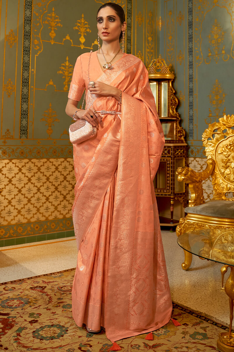 Mesmeric Peach Soft Banarasi Silk Saree With Twirling Blouse Piece