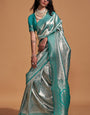 Demure Sea Green Kanjivaram Silk Saree With Ornate Blouse Piece