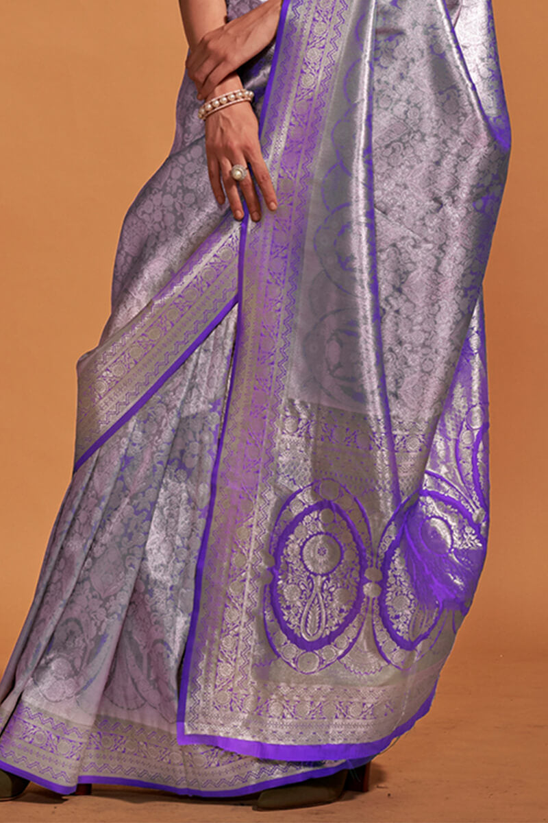 Gleaming Purple Kanjivaram Silk Saree With Intricate Blouse Piece