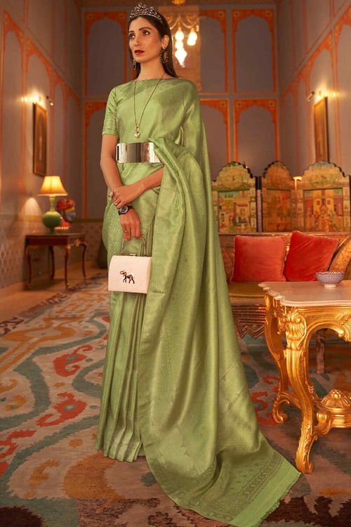 Load image into Gallery viewer, Staring Green Kanjivaram Silk Saree With Dazzling Blouse Piece
