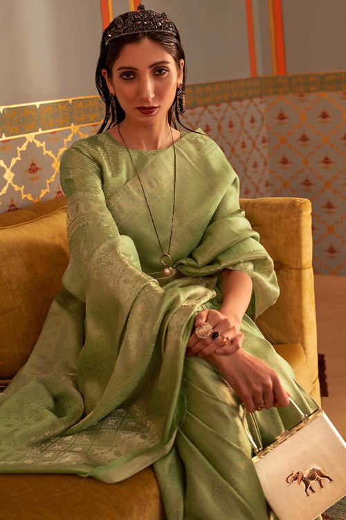 Load image into Gallery viewer, Staring Green Kanjivaram Silk Saree With Dazzling Blouse Piece

