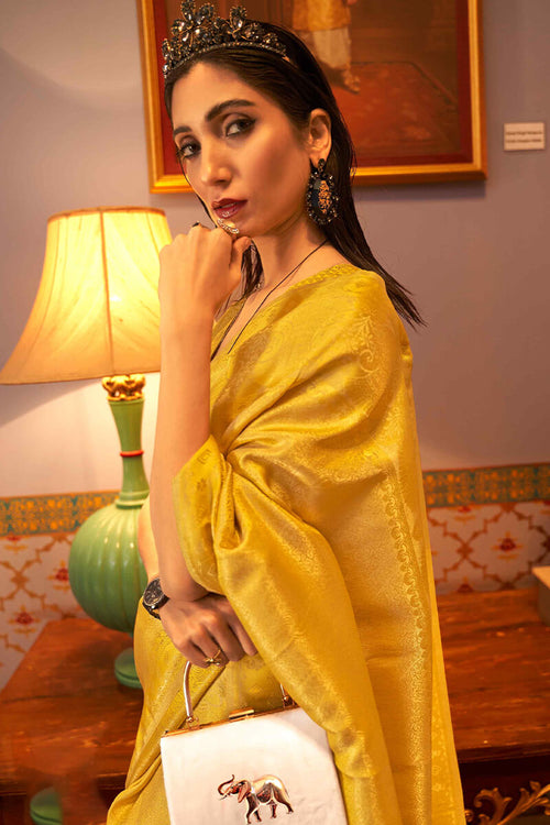 Load image into Gallery viewer, Blissful Yellow Kanjivaram Silk Saree With Stunner Blouse Piece
