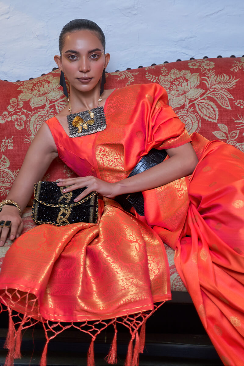 Beleaguer Orange Banarasi Silk Saree With Evocative Blouse Piece