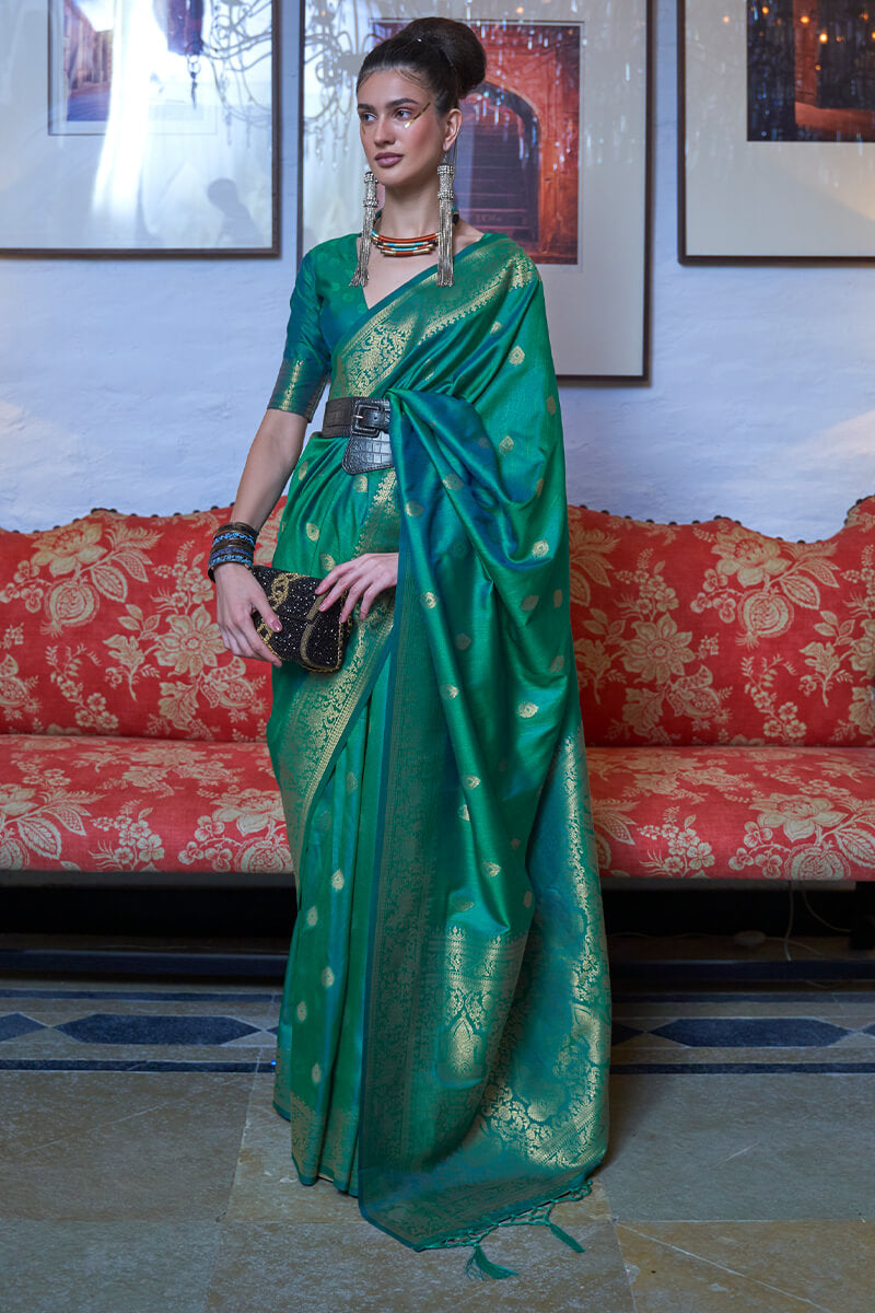 Smashing Sea Green Banarasi Silk Saree With Surreptitious Blouse Piece