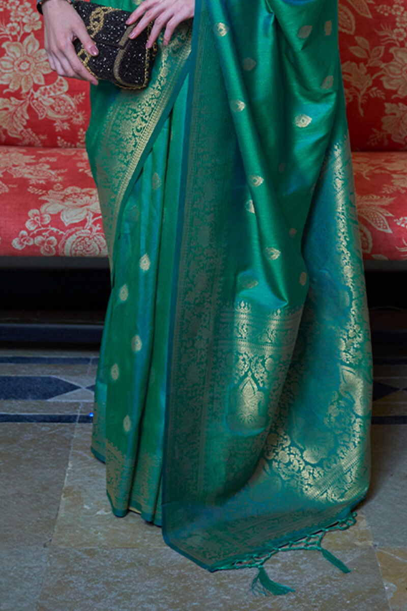 Smashing Sea Green Banarasi Silk Saree With Surreptitious Blouse Piece