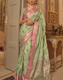 Twirling Pista Soft Banarasi Silk Saree With Blissful Blouse Piece