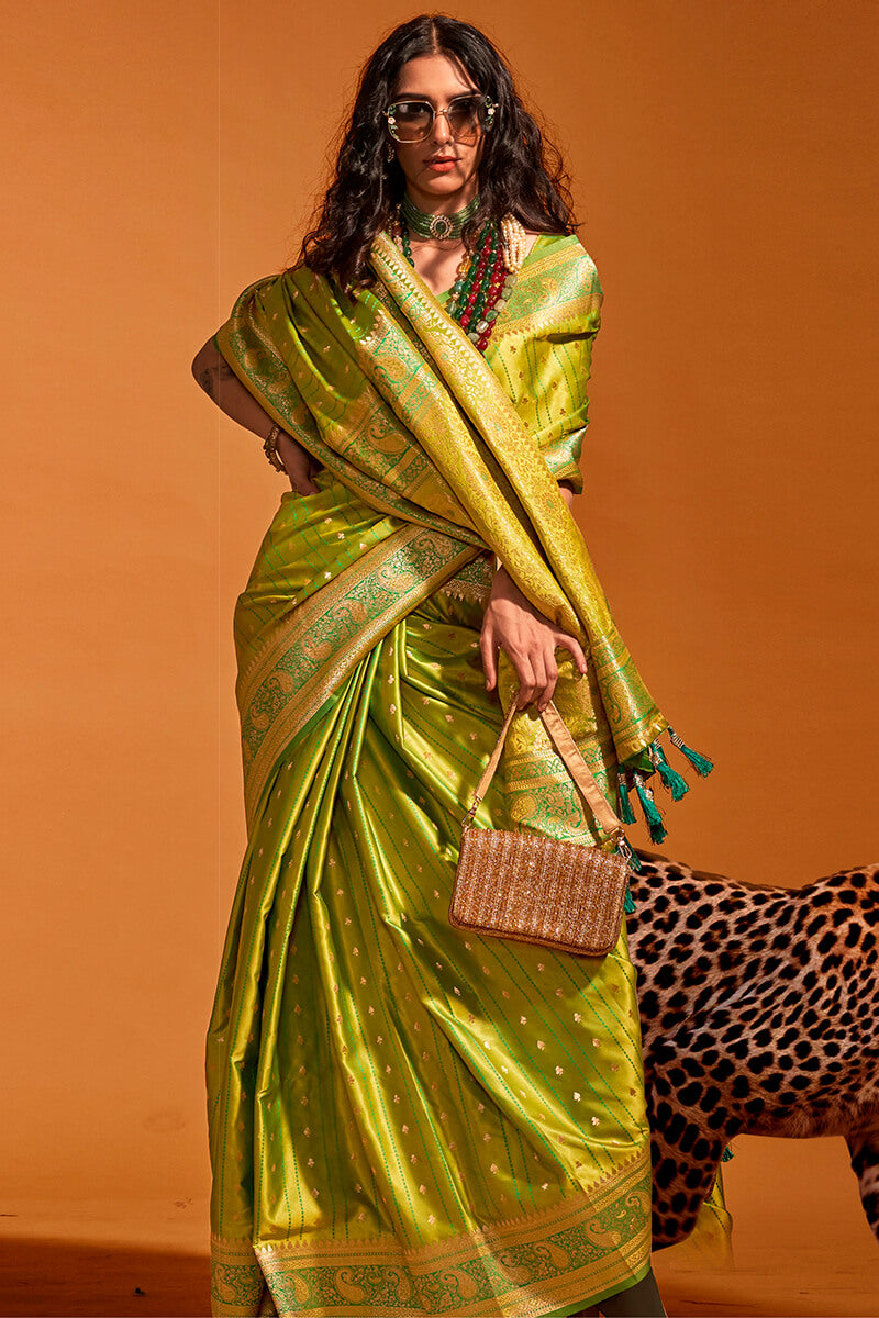 Amiable Green Soft Banarasi Silk Saree With Rhapsodic Blouse Piece