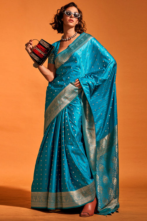 Load image into Gallery viewer, Susurrous Teal Blue Soft Banarasi Silk Saree With Embellished Blouse Piece
