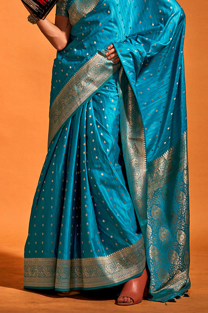 Susurrous Teal Blue Soft Banarasi Silk Saree With Embellished Blouse Piece