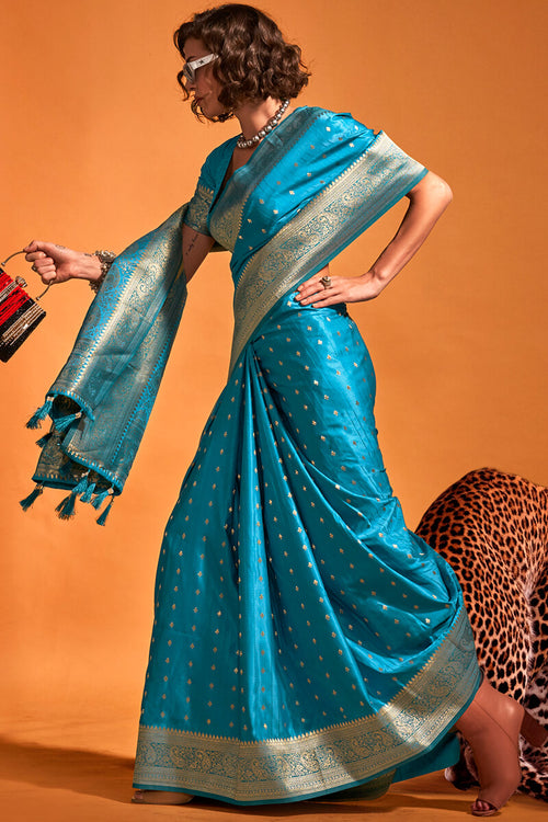 Load image into Gallery viewer, Susurrous Teal Blue Soft Banarasi Silk Saree With Embellished Blouse Piece
