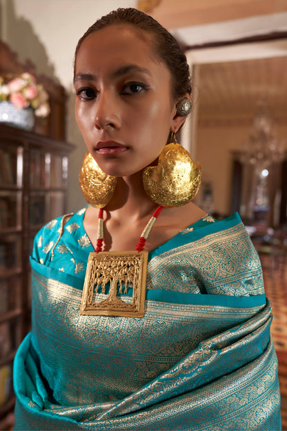 Sonorous Firozi Soft Banarasi Silk Saree With Charismatic Blouse Piece