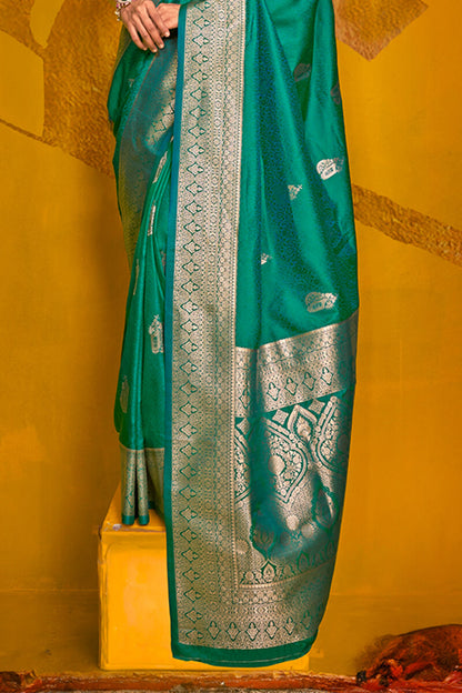 Eloquence Dark Green Soft Banarasi Silk Saree With Propinquity Blouse Piece