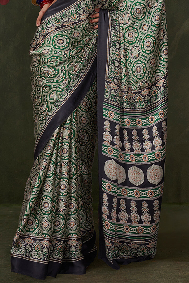 Glamorous Green Ajrakh Printed Satin Silk Saree With Cynosure Blouse Piece