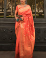 Appealing Orange Soft Banarasi Silk Saree With Groovy Blouse Piece