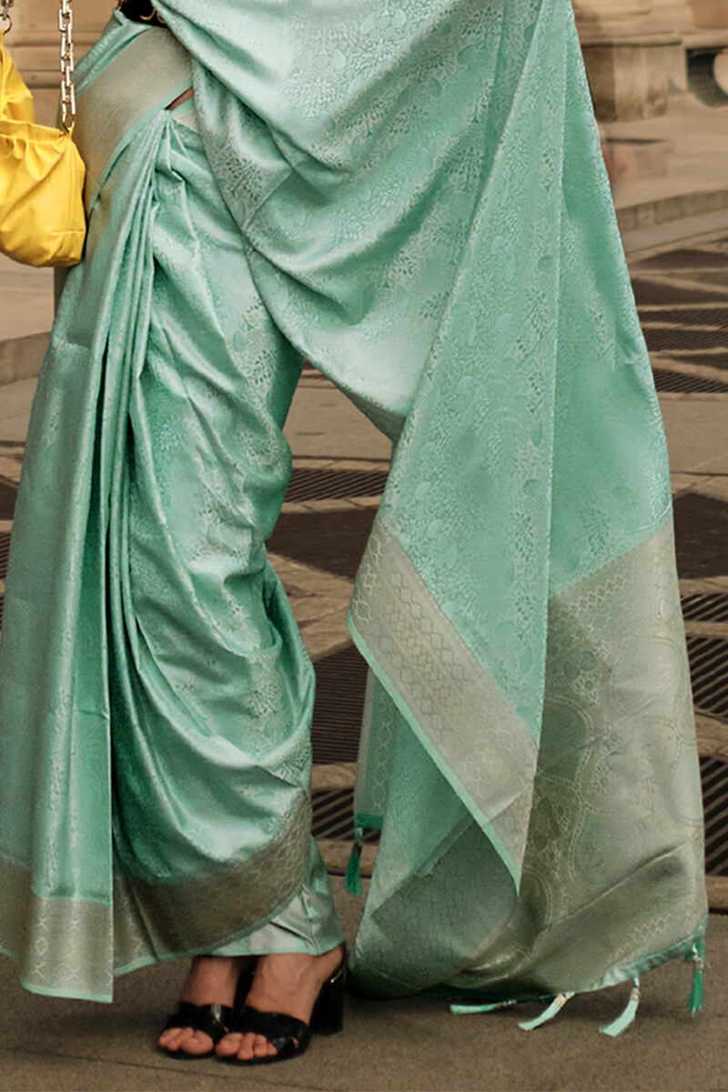 Attractive Sea Green Soft Banarasi Silk Saree With Whimsical Blouse Piece