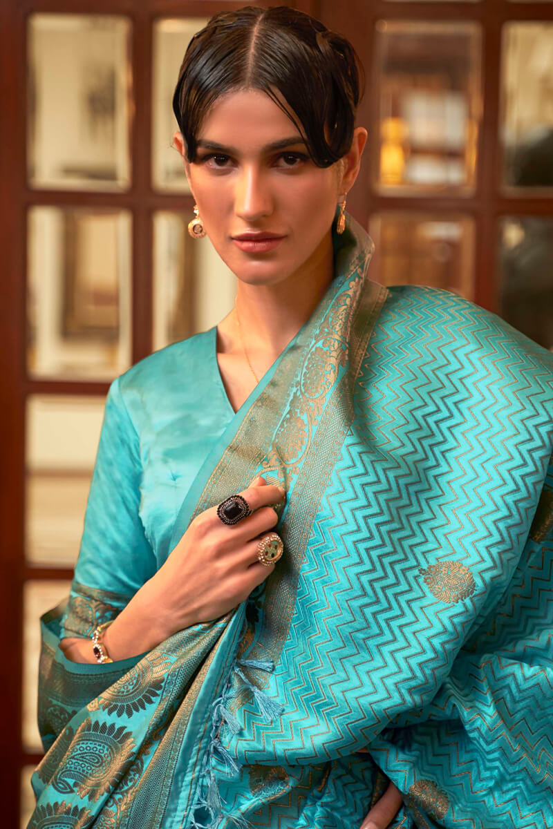 Trendy Firozi Soft Banarasi Silk Saree With Stunning Blouse Piece