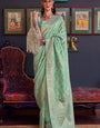 Scrumptious Sea Green Soft Banarasi Silk Saree With Tremendous Blouse Piece