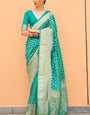 Gossamer Turquoise Soft Banarasi Silk Saree With Moiety Blouse Piece