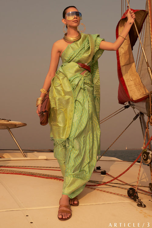 Load image into Gallery viewer, Desuetude Green Soft Banarasi Silk Saree With Ephemeral Blouse Piece
