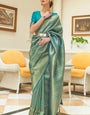 Sophisticated Rama Kanjivaram Silk Saree With Intricate Blouse Piece