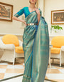 Energetic Firozi Kanjivaram Silk Saree With Opulent Blouse Piece