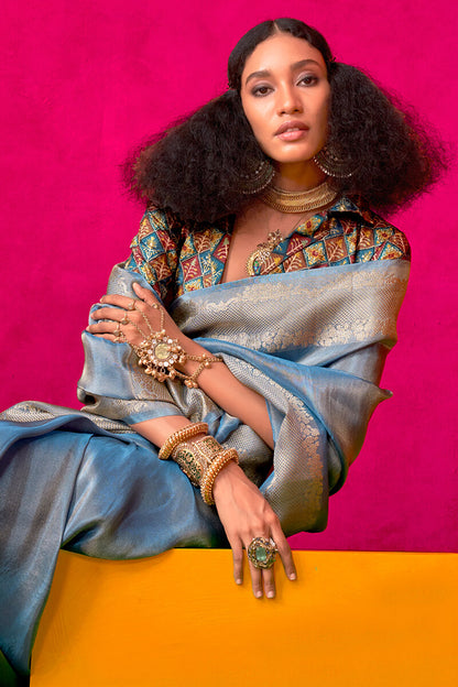 Ravishing Blue Soft Banarasi Tissue Silk Saree With Seraphic  Blouse Piece