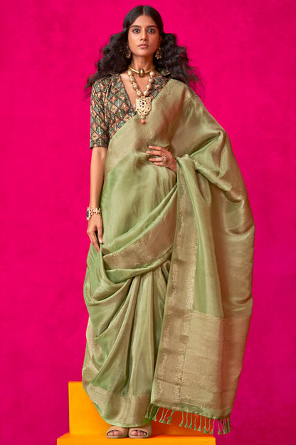 Resonant Green Soft Banarasi Tissue Silk Saree With Beauteous Blouse Piece