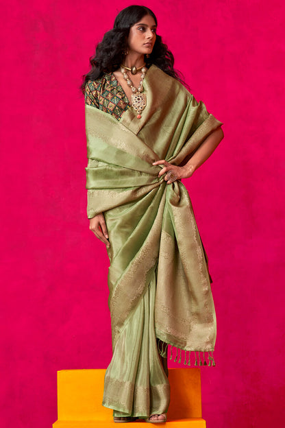 Resonant Green Soft Banarasi Tissue Silk Saree With Beauteous Blouse Piece