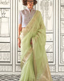 Delightful Pista Soft Silk Saree With Jazzy Blouse Piece