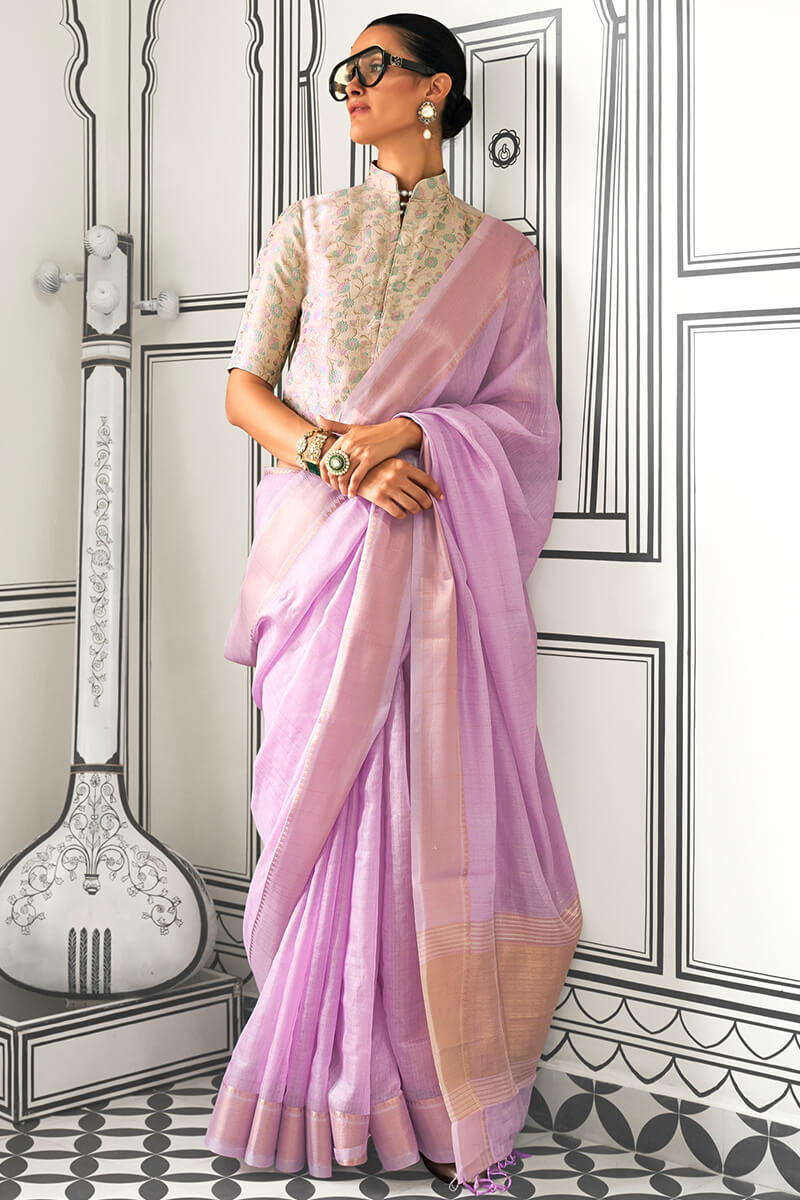 Entrancing Lavender Soft Silk Saree With Brood Blouse Piece